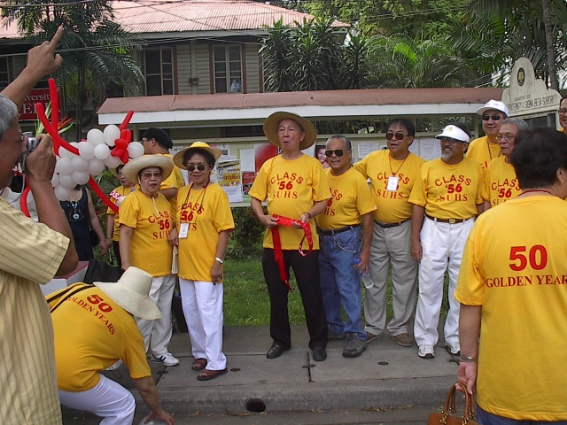 High School Class 1956, observing their Golden Jubilee gather in front of the Alumni Office